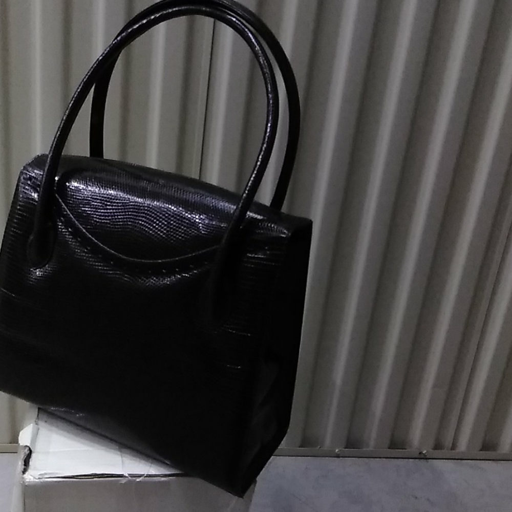 Hand bag new DARBY SCOTT. Lizard. No scratches, rips or sign of wear and tear.